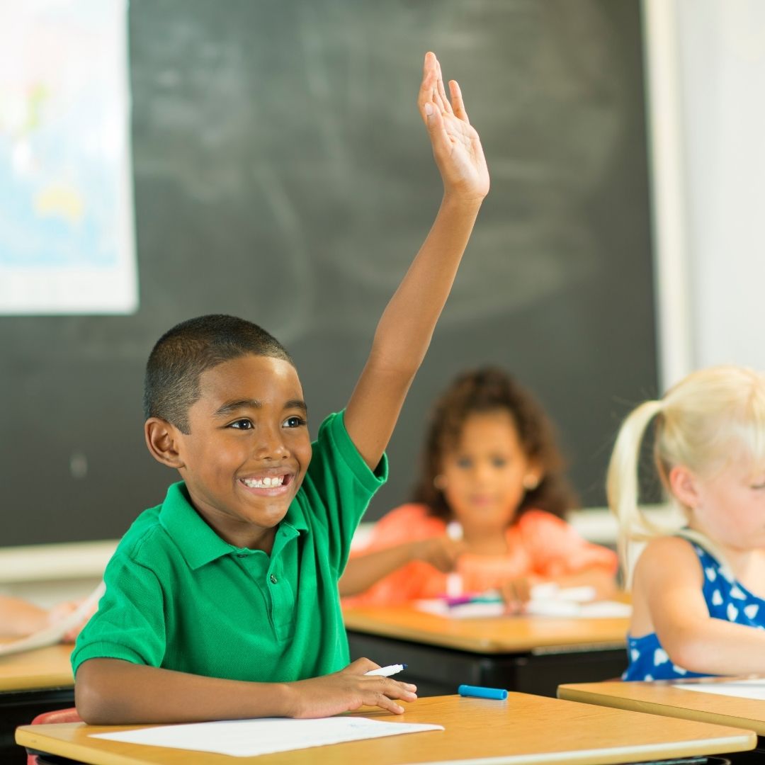 student raising hand