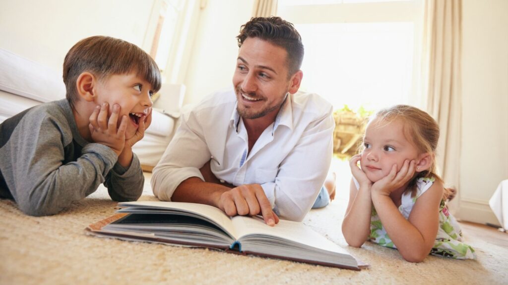 father reading to his kids
