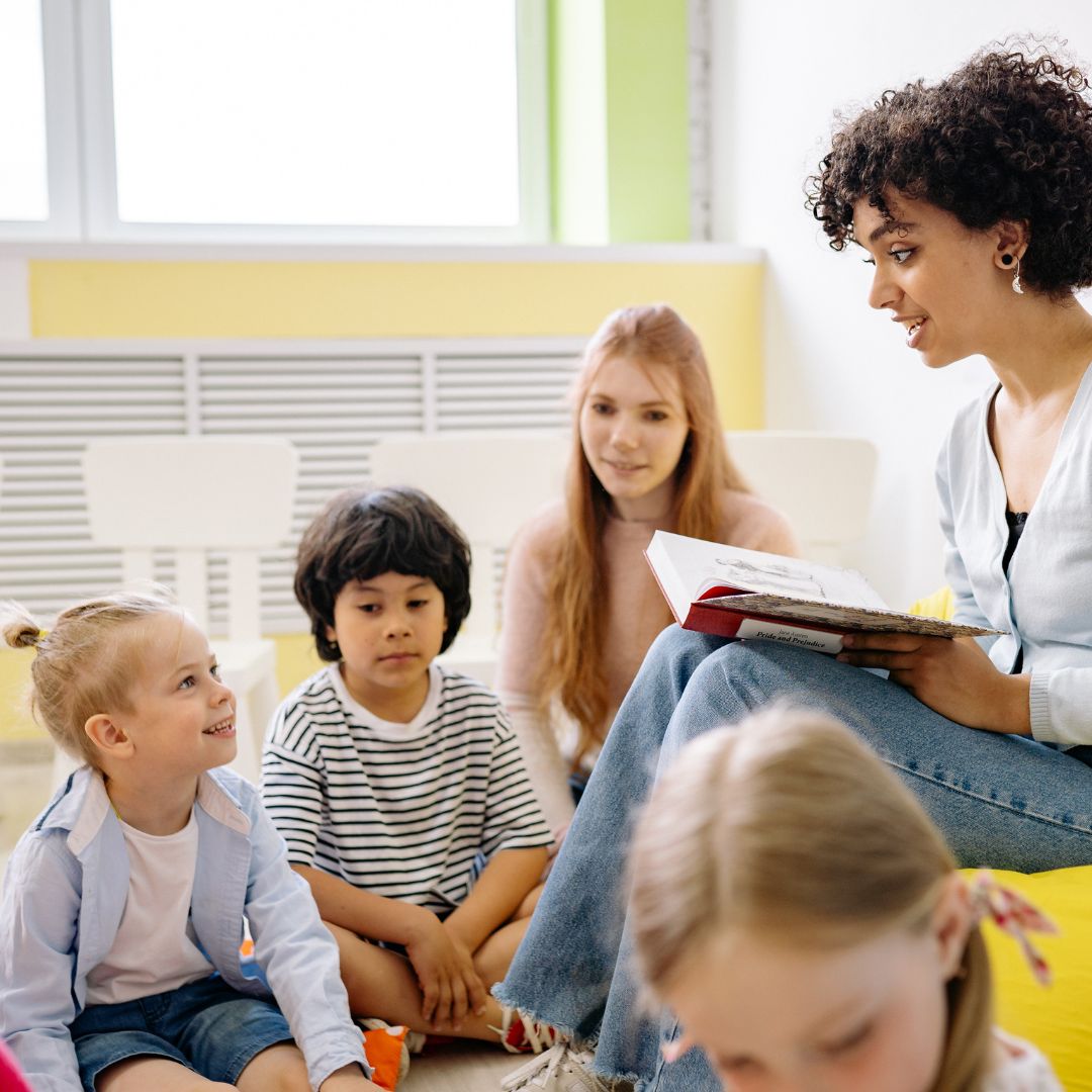 Teacher reading to children