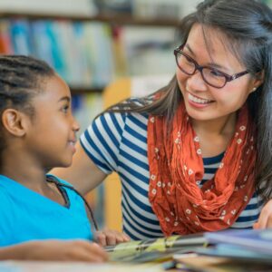 teacher with student