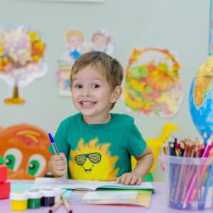 young boy coloring