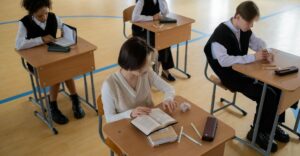 Students completing a test at their desk