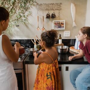 kids in kitchen with parent