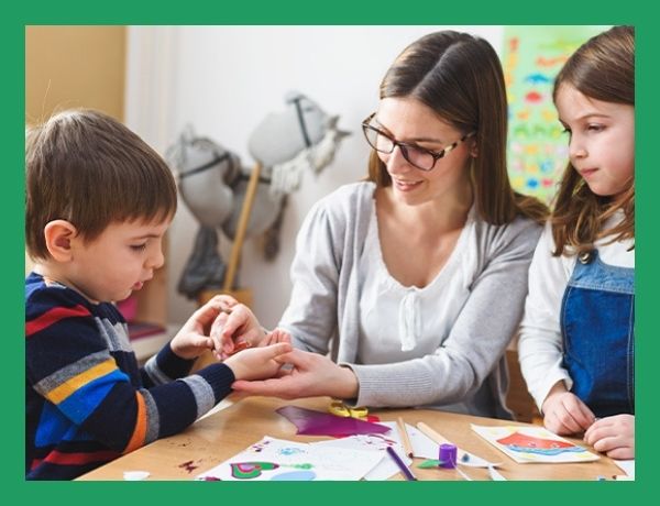 teacher working with children