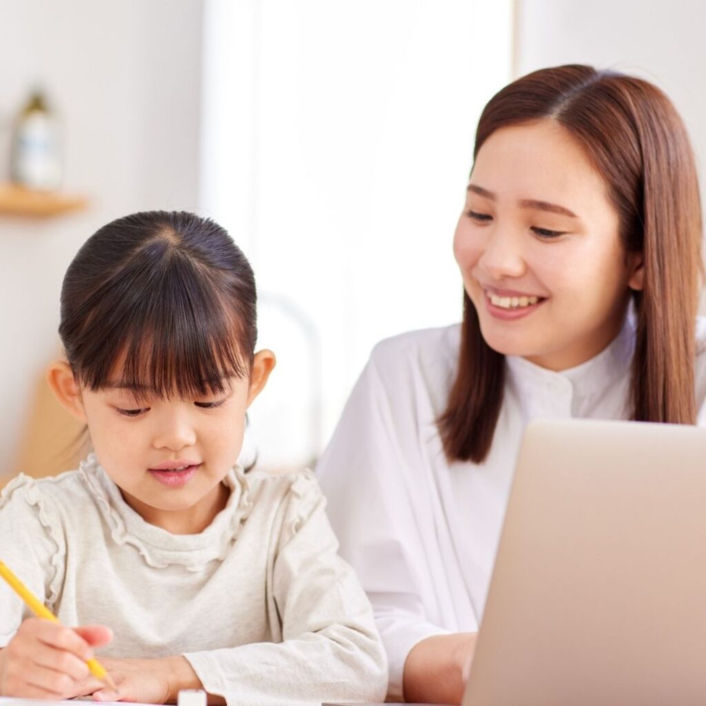 mom helping child with homework